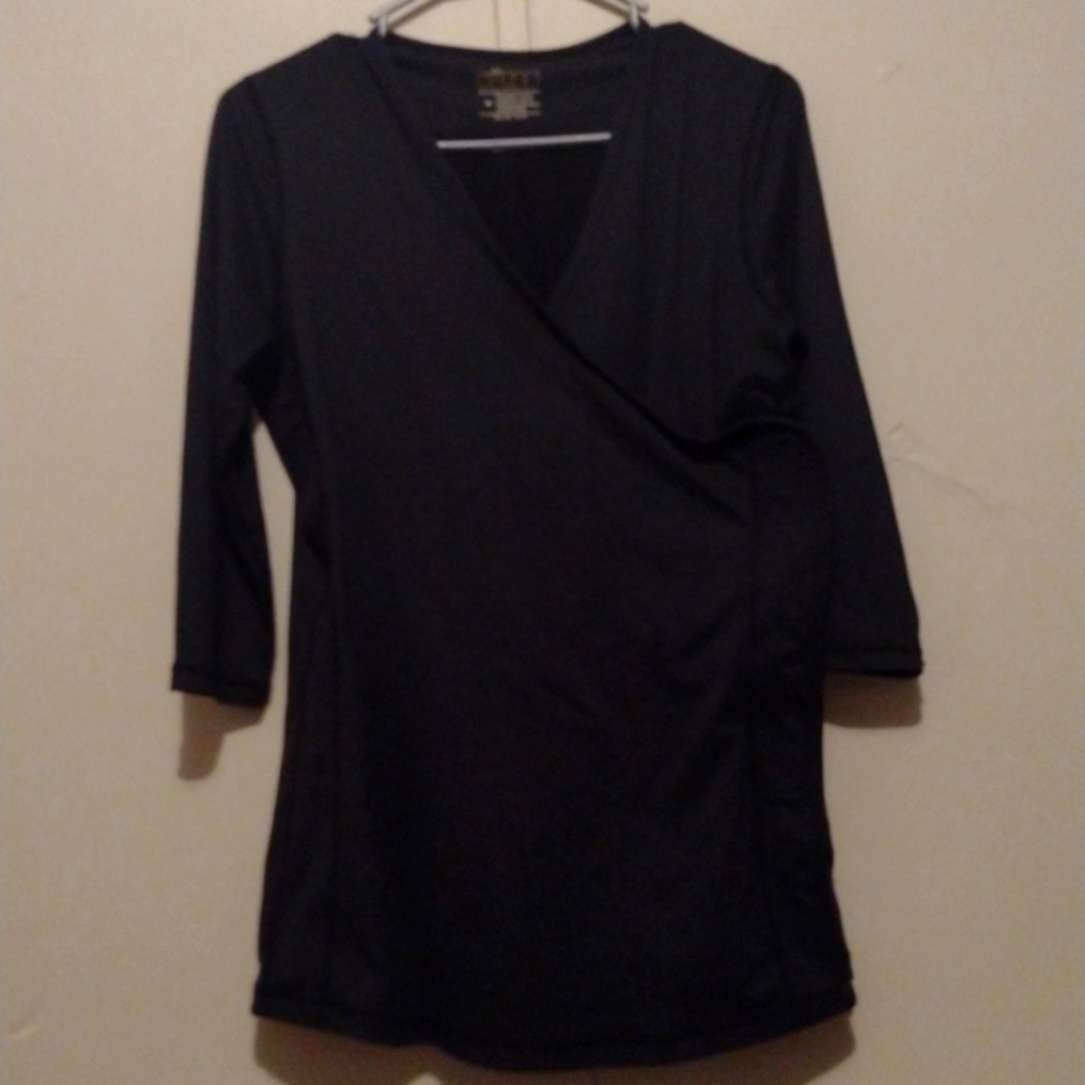 NuRoo baby wearing shirt